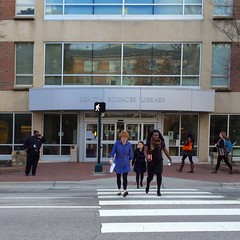 students walking in front of the HSL